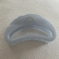 Macro shot of light blue translucent hair claw clip with a crescent shape and smooth finish - 20#