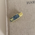 Detailed close-up of a yellow wavy edge hair clip with denim fabric and bow knots - Square Clip Yellow Base Mixed Bows