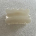 Detail view of the smooth cream jelly hair claw clip with elegant wavy edge design - Cream Wave (10#)