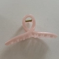 Top-down view of pink jelly hair claw clip with glossy resin finish and gold spring - 17#