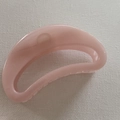 Detailed top view of a light pink translucent resin hair claw clip in half-moon shape - Light Pink Crescent (27#)
