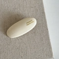 Elegant cream oval hair clip with France Handmade gold lettering on a linen texture - White Oval Hair Clip