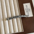 Handgefertigte Acetat-Haarklammer mit Leopardenmuster und goldenem Metallclip in Box - Schwarz-Weiß Textur Haarklammer
