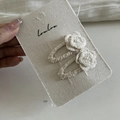 Close-up of handmade cream crochet flower hair clips with small pearl centers - 8# Double White Floral Drop Clip