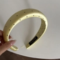 Detail of yellow satin polka dot padded headband featuring premium sponge texture - 3CM Padded / Yellow Polka Dot Headband