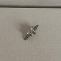 Elegant silver brushed metal bow hair clip with a polished finish on textured background - Silver Bowknot
