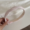 Light pink twisted fabric headband with anti-slip teeth and minimalist retro design - Pink Twist Style