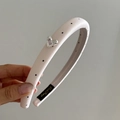 Dettaglio cerchietto rosa a pois con cuore in argento e gemma viola incastonata - Stile Rosa / Rosa a pois neri (Cuore d'argento)