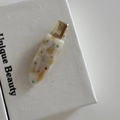 Close-up of cream acetate hair clip with colorful dots and gold duckbill metal base - 5# Milk White Texture Colorful Rhinestone Hair Clip