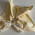 Detailed view of yellow and white striped bow hair scrunchie with lace texture - Yellow Striped Bow Scrunchie