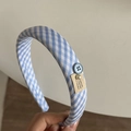 Detailed texture of blue plaid padded headband with button and pearl accents - Blue Plaid Headband