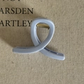 Detailed view of cream blue hair claw clip with golden spring on textured linen fabric - 14# Lavender Cross