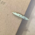 Elegant mint green acetate hair clip with brown polka dots and gold label detail - Mint Green Polka Dot Long Style