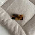 Macro view of rectangular tortoiseshell hair clip with gold label on beige linen - 7# Dark Leopard Rectangle Hair Clip