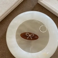 Brown acetate oval hair clip with bow detail and silver wavy ring on marble tray - 9# Khaki Oval With Coffee Bow