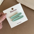 Set of two minimalist mint green oval hair clips on a white display card for girls - Green Oval Hair Clip