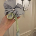 Elegant grey-blue tulip scrunchie with green velvet ribbon and decorative spheres - Blue