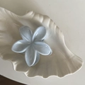 Sky blue flower claw clip with marble texture for thick hair in a shell tray - Blue Fabric Flower Claw Clip