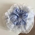 Macro detail of blue polka dot scrunchie featuring white lace and layered mesh frills - Blue Lace Edge Scrunchie with Black Dots