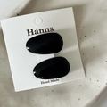 Set of two black oval hair clips with polished resin finish on a white display card - Black Oval Hair Clip