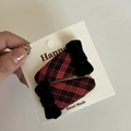 Detail view of retro red and black plaid hair clips with black velvet bow accents - Red Black Stripe Teardrop Bow Hair Clip