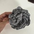 Detail of British plaid rose hair claw showing multilayer fabric and texture - Gray Striped Flower