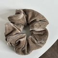 Detail of khaki velvet scrunchie with elegant gold thread trim and soft satin texture - Milk Tea Flocked Hair Tie