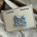 Set of two light blue floral bow hair clips for girls on a vintage cream display card - Floral Blue Bow Pair (11#)