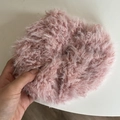 Detail view of oversized pink plush scrunchie with soft faux lamb wool texture - Pink Plush