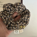 Detail of tweed hair scrunchie with gold bow charm and journey text woven label - Yellow Blue Stripe Scrunchie Gold Bow