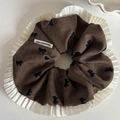 Caramel brown bow pattern scrunchie with white pleated lace trim and slogan tag - Khaki Bow Lace Edge