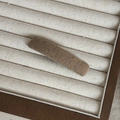 Brown woven fabric BB hair clip with textured wool finish on cream display tray - Milk Tea Rectangular Clip