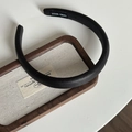 Black padded faux leather headband with handmade label on a minimalist wooden tray - Black (2cm Headband)