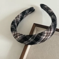 Detailed close-up of handmade plaid headband with red accents on a wooden display - 7# Black White Plaid Headband