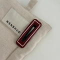 Minimalist canvas bag detail featuring woven Wenshuo logo label and textured red accent - Wine Red Square White Stripe Hair Clip (6#)