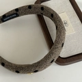 Detailed macro view of handmade polka dot wool headband with padded sponge structure - Coffee Black Polka Dot (3# Coffee Black Polka Dot Gold Label)