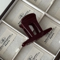 Elegant vintage dark red hair claw clip in a glossy resin finish displayed in a box - Straight Claw / Ancorra Red