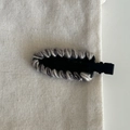 Close-up of woven French acetate hair clip with gray and white yarn on white linen background - Black (with Grey White Wool/No Bow)