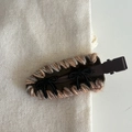 Close-up of woven acetate hair clip with brown yarn trim and two black bow details - Khaki (with Khaki Grey Wool/Black Bow)