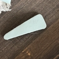 Close-up of mint green plaid fabric texture on a minimalist vintage style hair clip - Solid Green Triangle Hair Clip