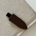 Close-up of a brown leopard print fabric-wrapped duckbill hair clip on a beige textured background - 9# Solid Khaki Seamless Clip