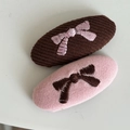 Detail of two knit bow hair clips featuring delicate pink and brown embroidery for women - Pink Oval Bow Hair Clip (14#)