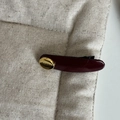 Deep burgundy glossy hair clip featuring an elegant gold Paris engraved metal plate - Wine Red Curved Gold Label