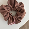 Brown ribbed fabric scrunchie with pink embroidered letter detail on white background - Coffee Scrunchie Pink Letter (4#)