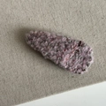 Detail of a mauve plush knit teardrop BB hair clip on a textured linen background - Pink Plush Hair Clip