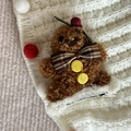 Plush Gingerbread Man Christmas hair clip with plaid bow on white knitted background - Gingerbread Man Bow Hair Clip