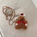 Gingerbread man plush ornament with red Christmas hat and brown lanyard accessory - Gingerbread Man Red Scarf Lanyard