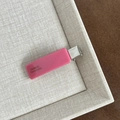 Detail of candy-colored hot pink acetate duckbill hair clip with France Handmade gold text - Pink Duckbill Clip