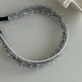 Silver metallic thread headband with white pearl accents on light gray background - #2 Silver Furry Headband With Pearl Trim