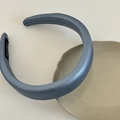 Detail of blue faux leather padded headband with handmade label and stitching - 3cm / Blue